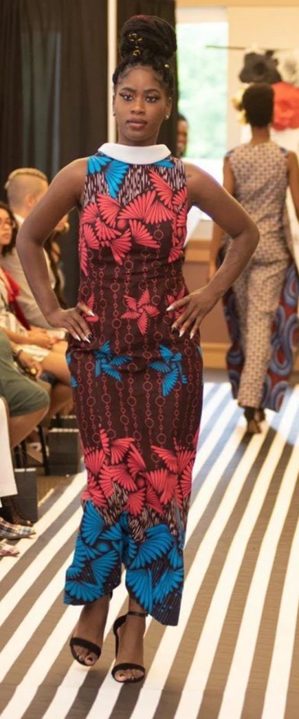 Model on runway wearing African Print Fitted Dress with Collar.